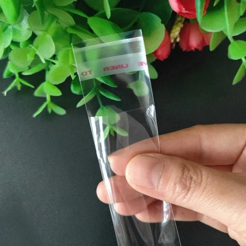 100pcs Opp Self Adhesive Bag Long Transparent Packaging Bags Universal Dust Water Proof Wrapping Material 99 in 1