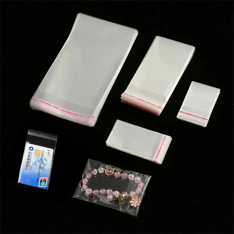 100pcs Opp Self Adhesive Bag Long Transparent Packaging Bags Universal Dust Water Proof Wrapping Material