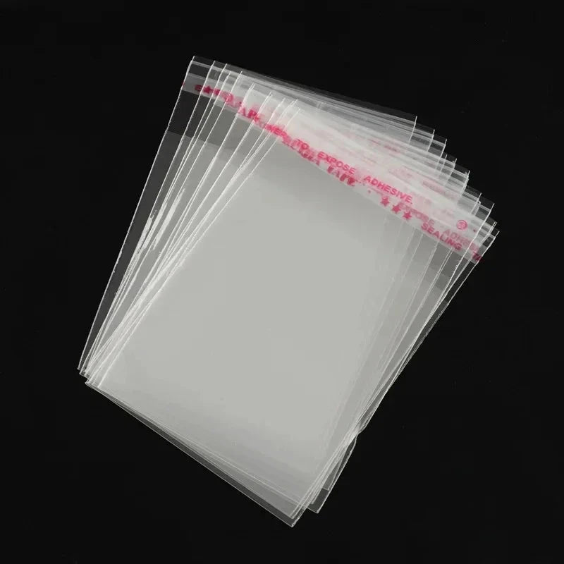 100pcs Opp Self Adhesive Bag Long Transparent Packaging Bags Universal Dust Water Proof Wrapping Material 99 in 1